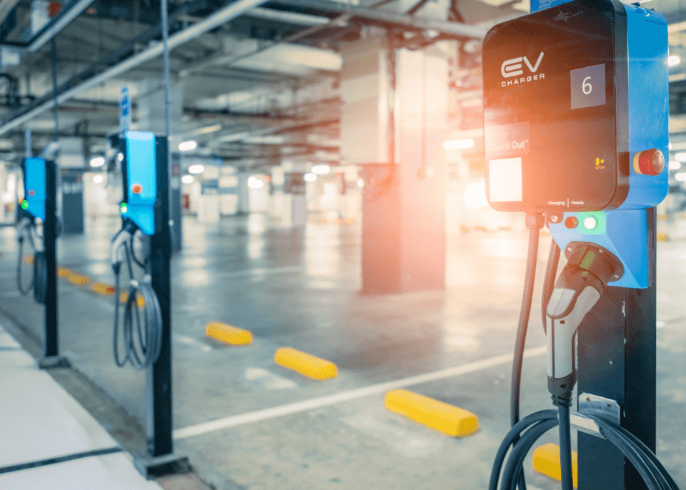 network of electric chargers in underground parking lot